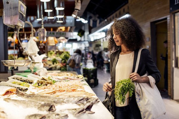 Woman shopping for seafood