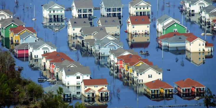 An overhead shot of flooded homes