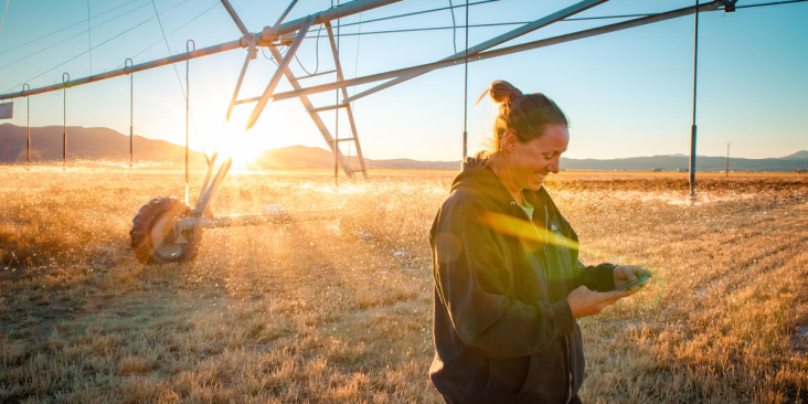 Nevada farmer Denise Moyle by her irrigation system