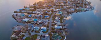 Homes on an island community in Florida, viewed from overhead.